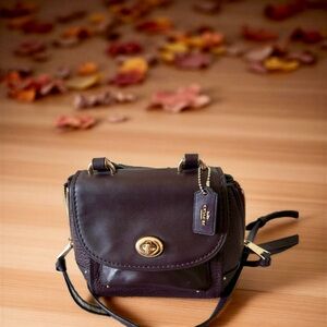 Coach Dark Brown Pebbled Leather Turn-Lock Crossbody or mini back pack